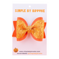Orange Leather & Chunky Glitter Pinch Bow